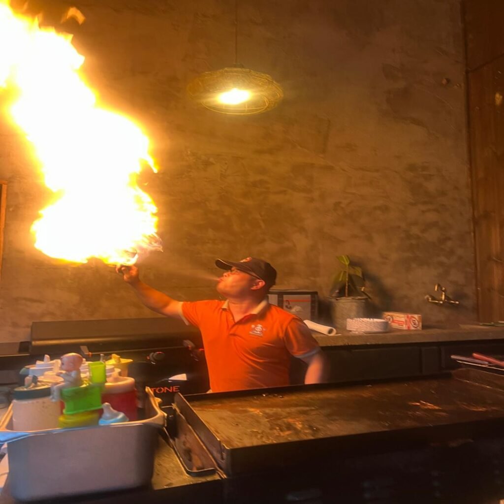 Hibachi chef fire show at a backyard party in Chicago