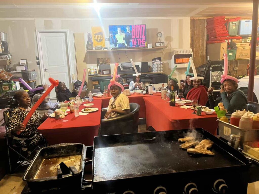 live hibachi cooking show at home Birmingham guests enjoying dinner